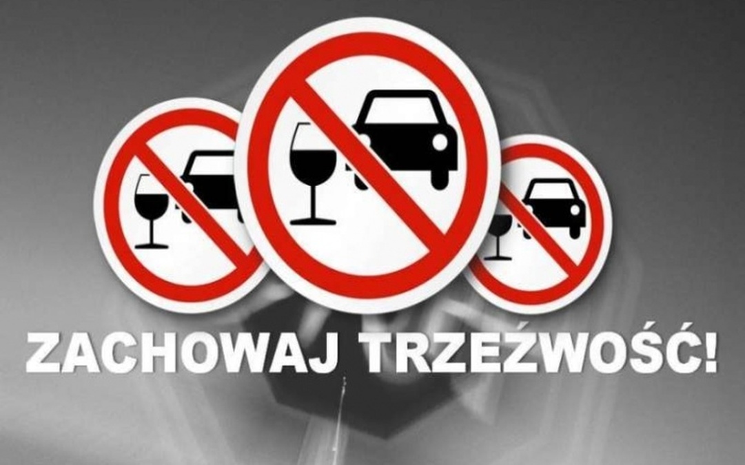 Plakat z napisem "Zachowaj trzeźwość", samochód i kieliszek przekreślony.