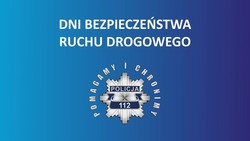 Napis &quot;Dni Bezpieczeństwa Ruchu Drogowego&quot; i odznaka policyjna